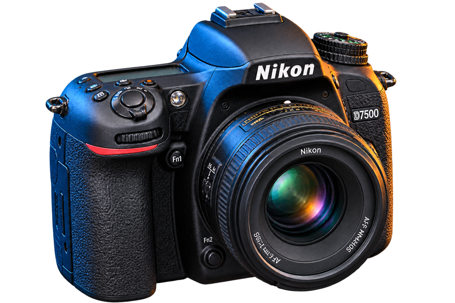 Nikon D7500 camera floating beside Bassel El-Bizri's computer